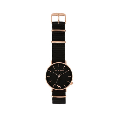 Rose gold and black watch with a soft black nato band and rose gold black buckle designed by THE HOUND, styled flat and shot from above.